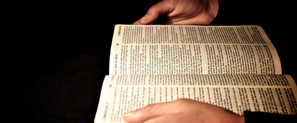 Open Bible in Hands